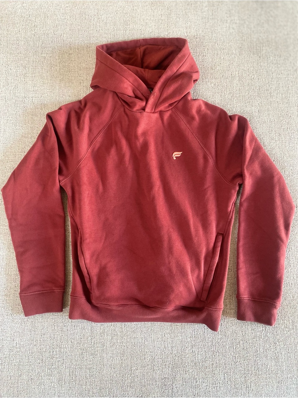 Fabletics Women's Go to Hoodie in Brick Red